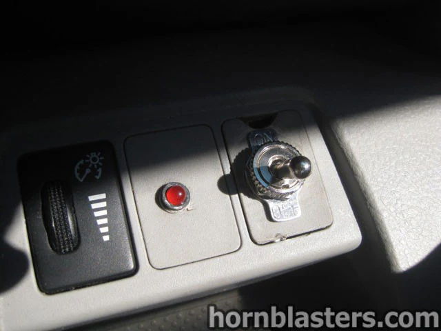 Dashboard metal toggle switch indicator light horn activation Wesley's Toyota RAV4 228H cabin install gallery photo 6