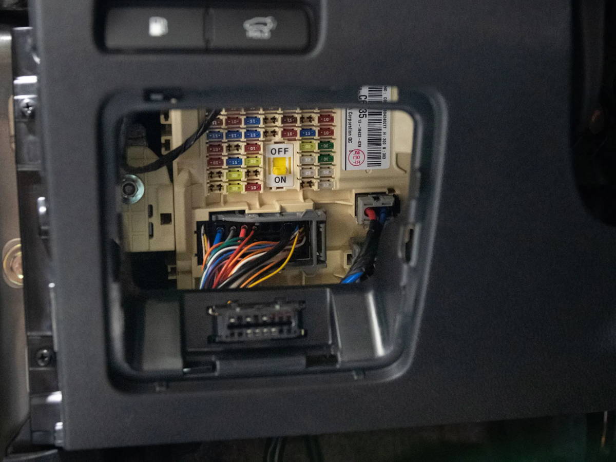 Vehicle fuse area prepared for dash cam hardwiring