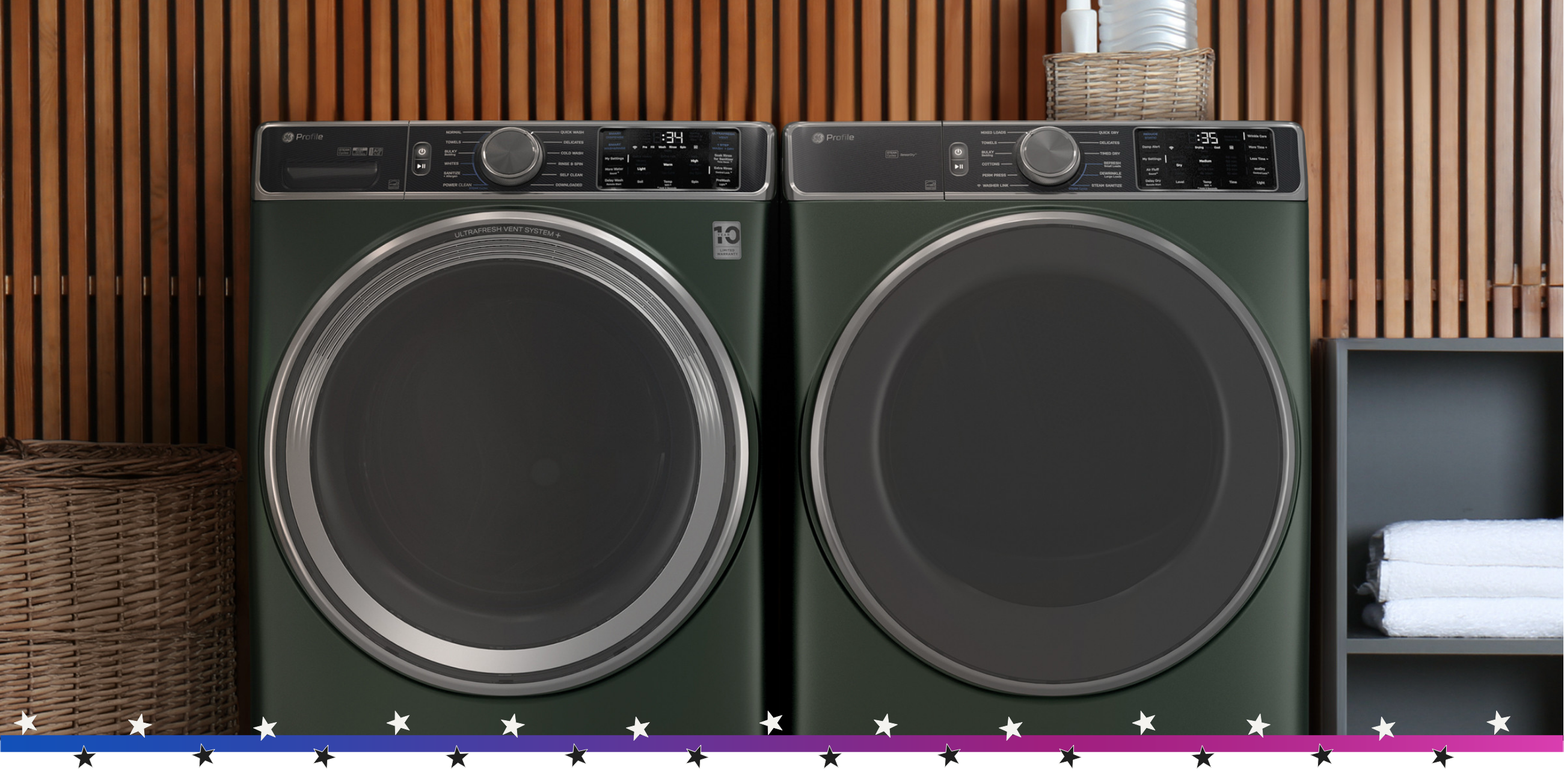 A green washer and dryer set against a wooden background.