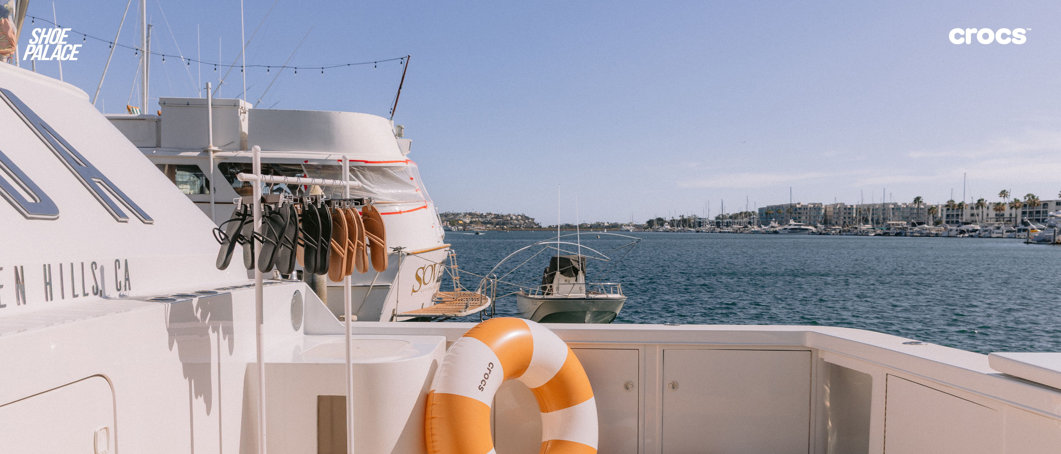 A view from a boat overlooking a calm waterway and shoreline.