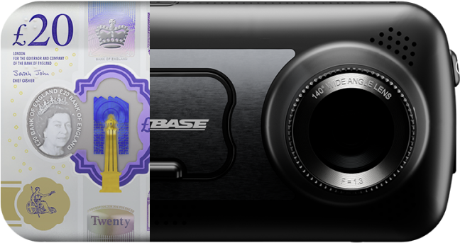 £20 note next to a black camera device.
