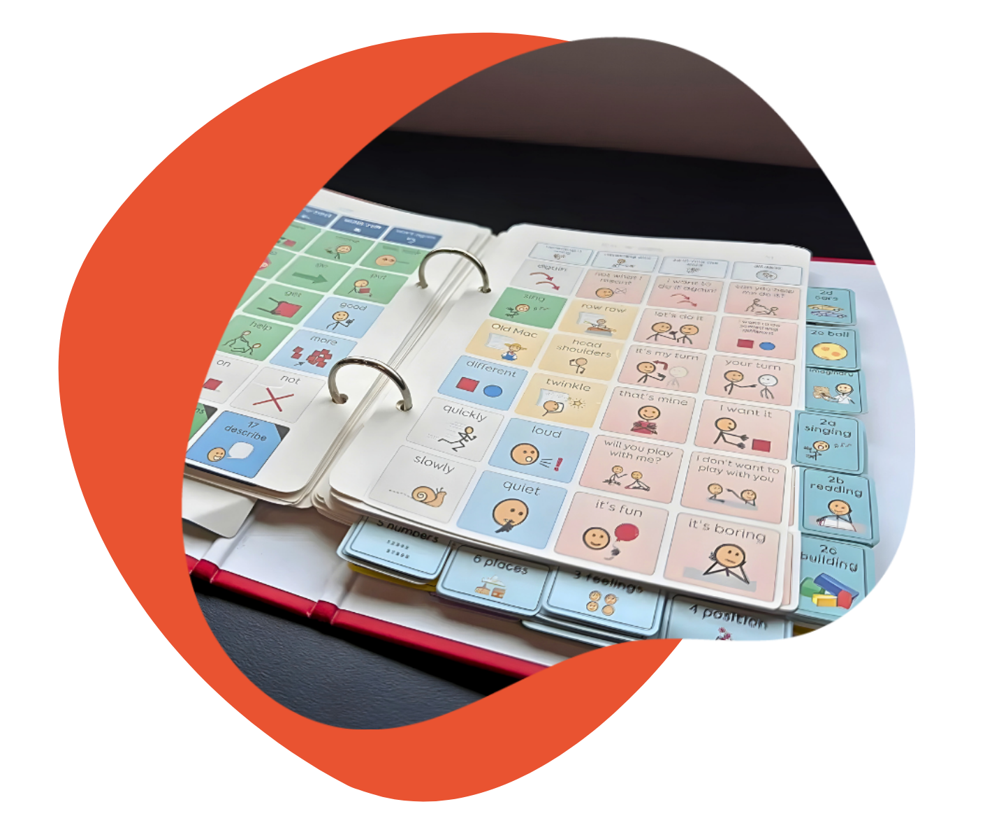A binder with colorful communication symbols and illustrations.