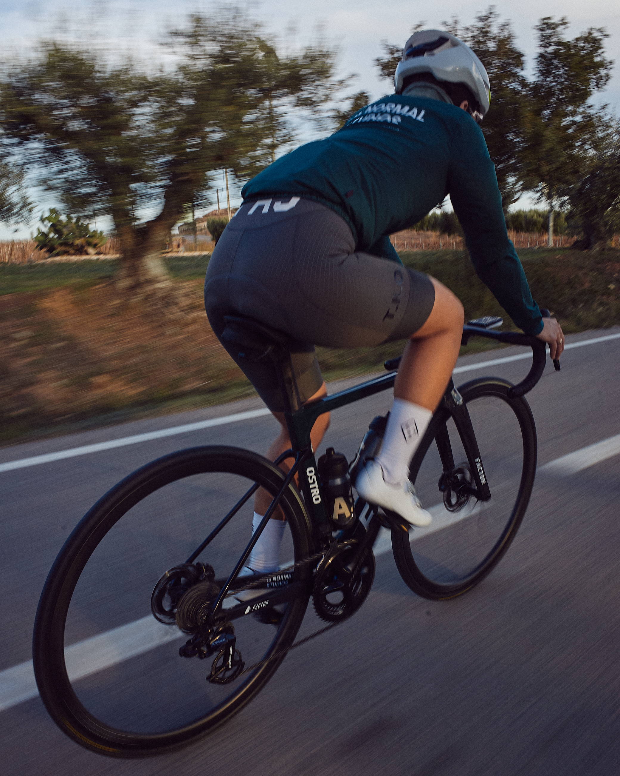 Cyclist racing along a road