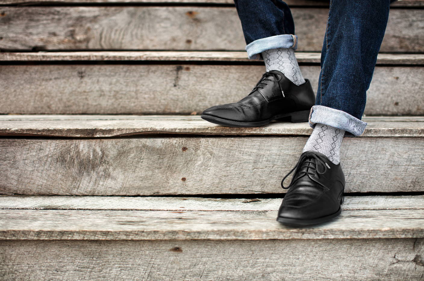 Man wearing Therafirm patterned compression socks