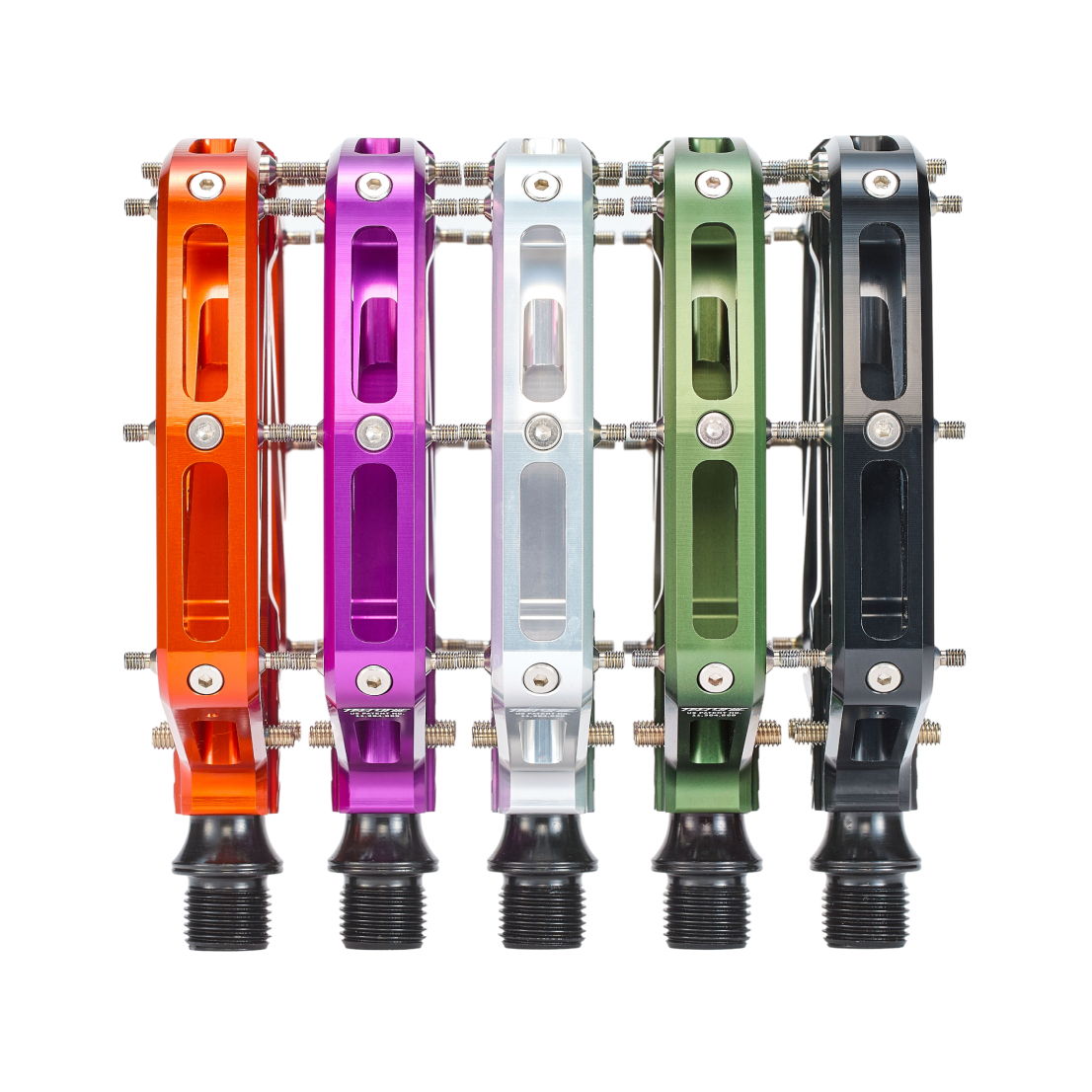 Five colorful bicycle valve caps lined up in a row.
