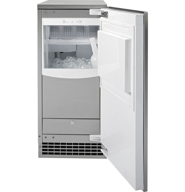 A stainless steel refrigerator with an open door and ice compartment.
