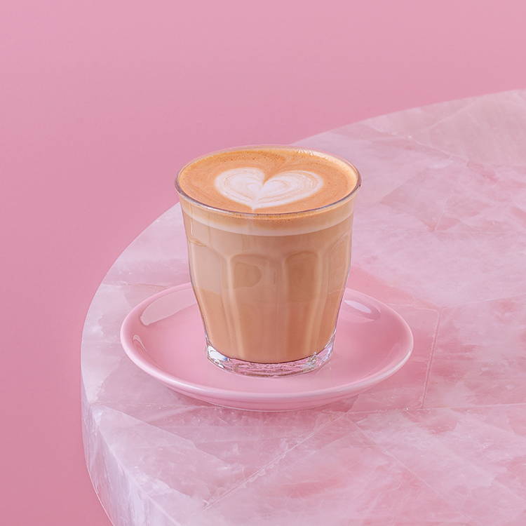 Cafe Latte on pink background