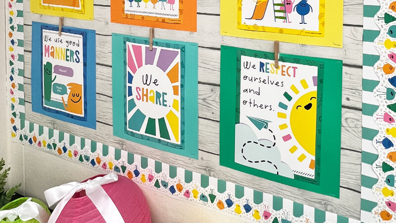 Colorful Bulletin board classroom display with  happy colorful motivational charts.