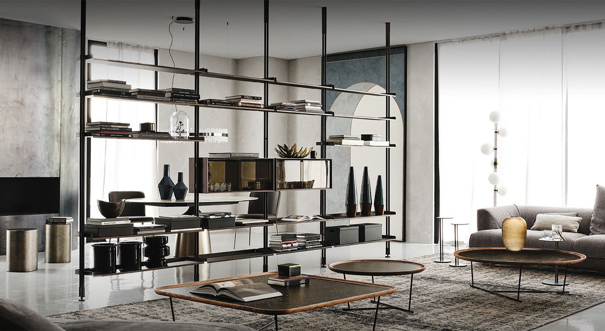Modern Cattelan Italia living room with open shelving, dining area, and large windows.