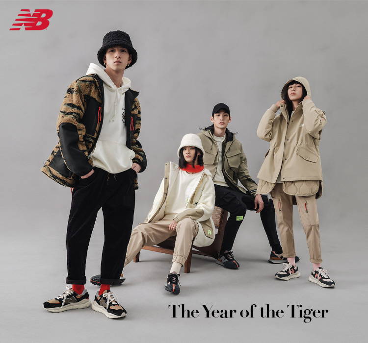four models wearing new balance chinese new year footwear and apparel 