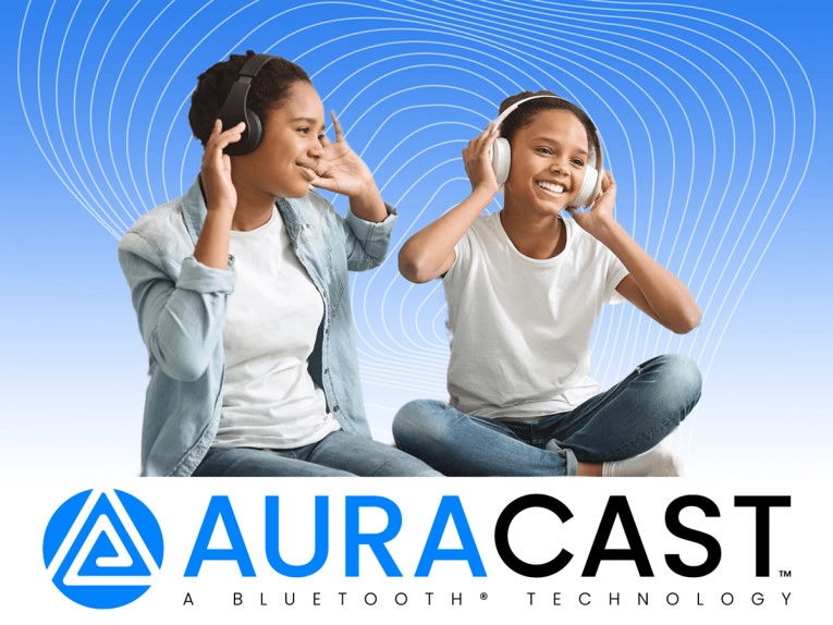 Two girls enjoying music with headphones, featuring AURACAST branding.