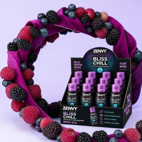 Display of Zenny Bliss Chill products surrounded by colorful berries.