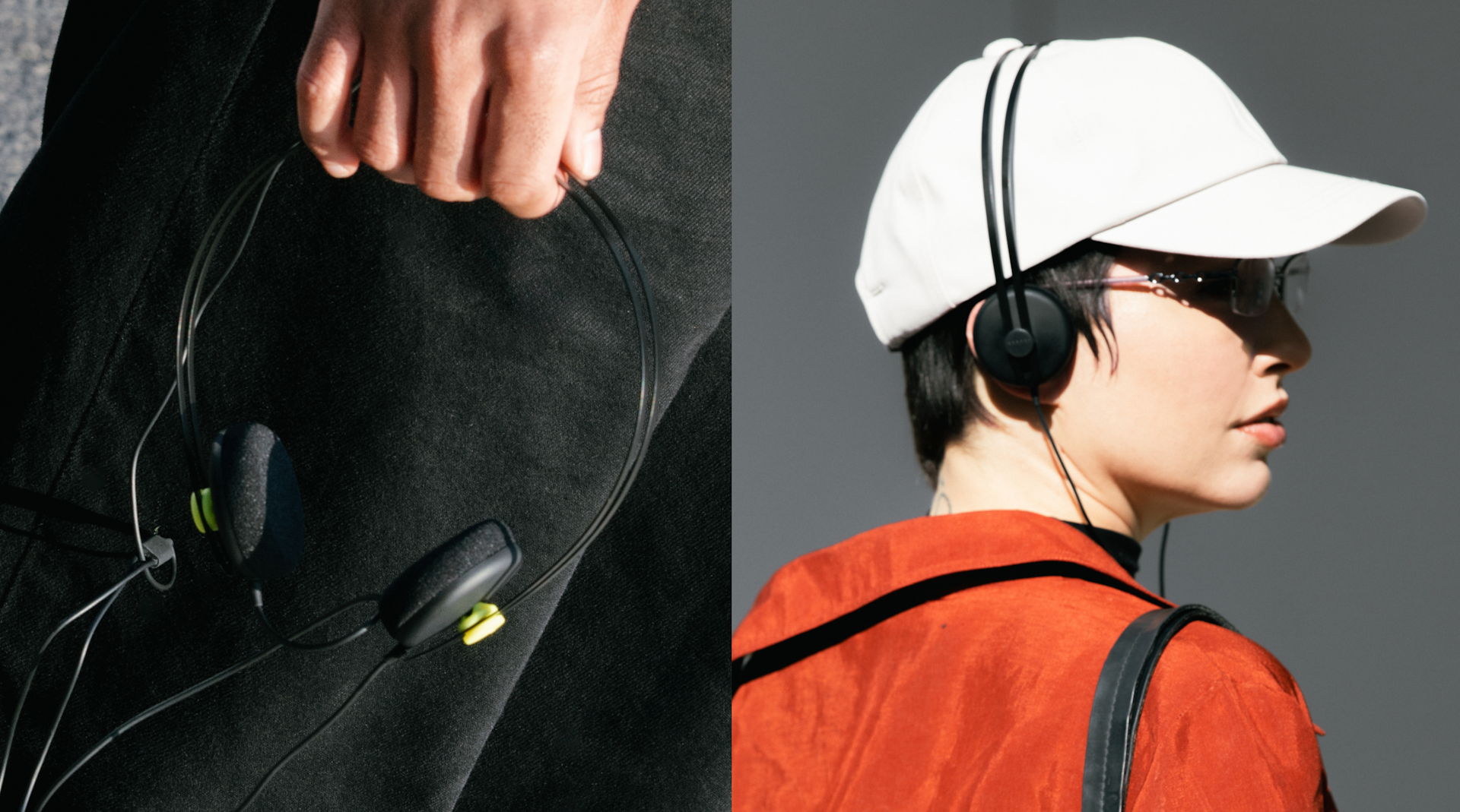 Person wearing headphones, holding another pair; fashionable urban style.