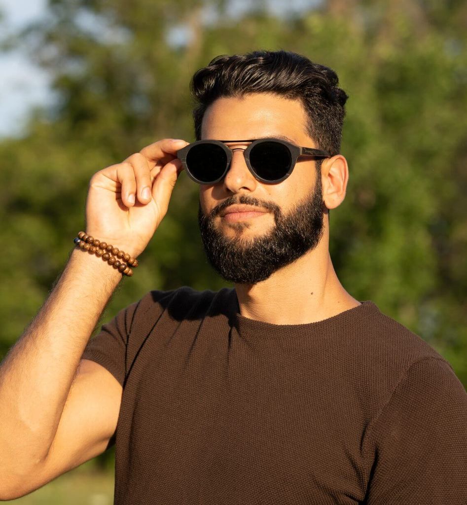 man with diamond face shape wearing Ash, round aviator sunglasses frames
