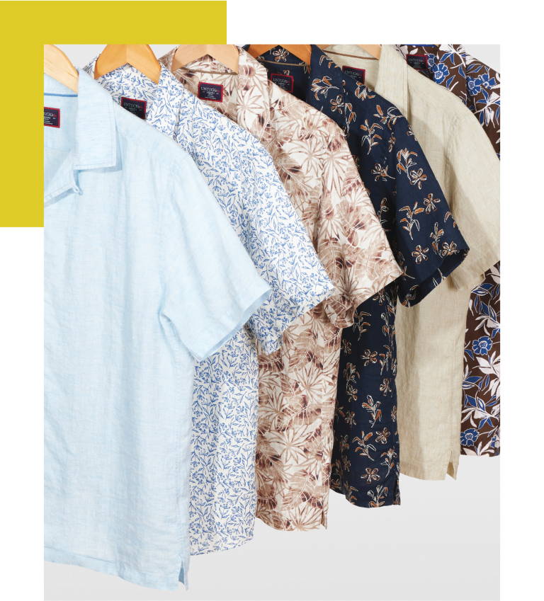Collection of UNtUCKit sort sleeve shirts in various colors. 