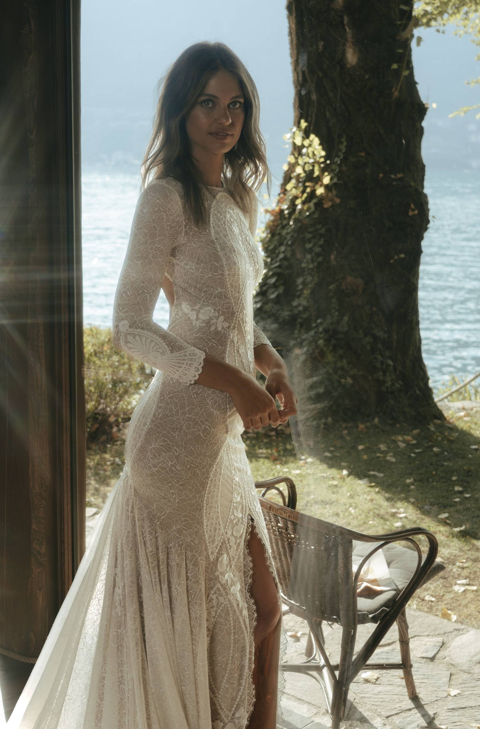 Model in Pierlot Gown with Italian coastline in background