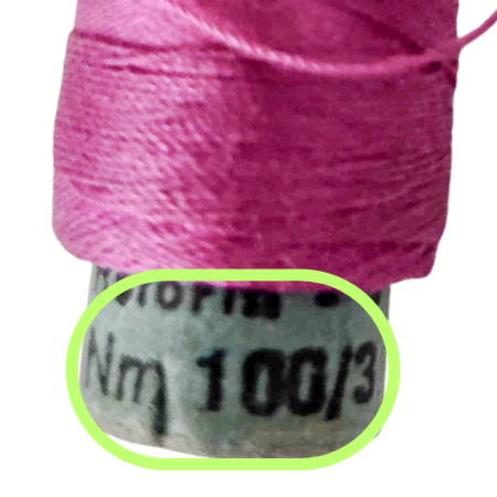 Thread spool with Metric Number weight marking on it