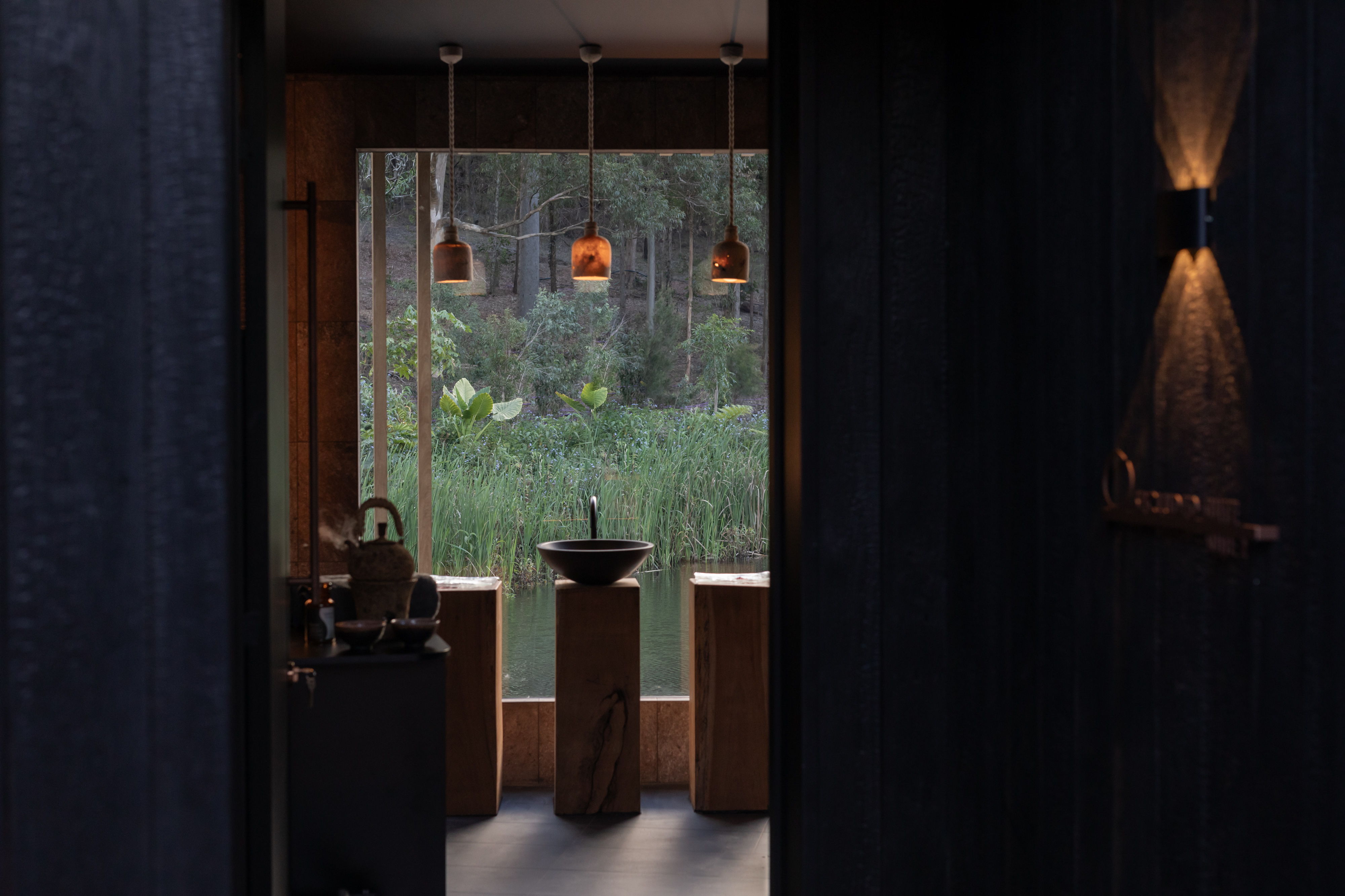 Fossil Coral Dome Pendants in a minimalist room overlooking garden