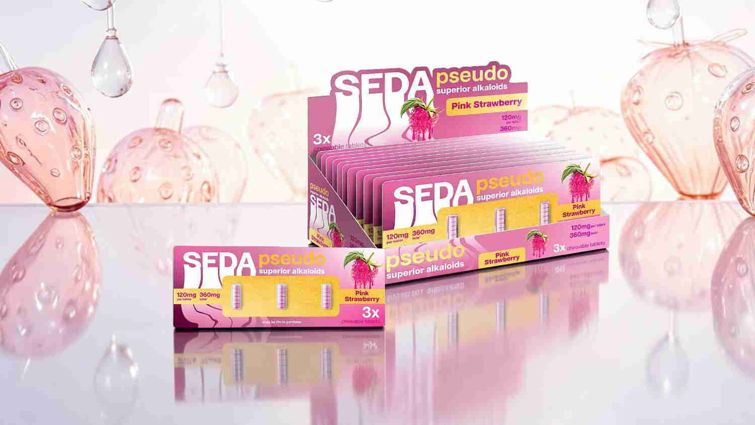 Seda hair care products displayed on a reflective surface with a pink background.