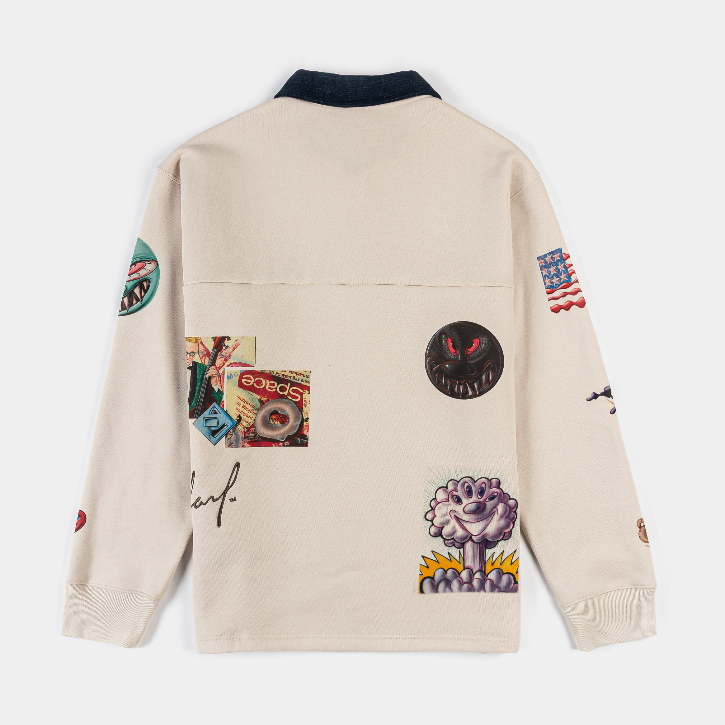 Beige collared shirt with various colorful embroidered designs.