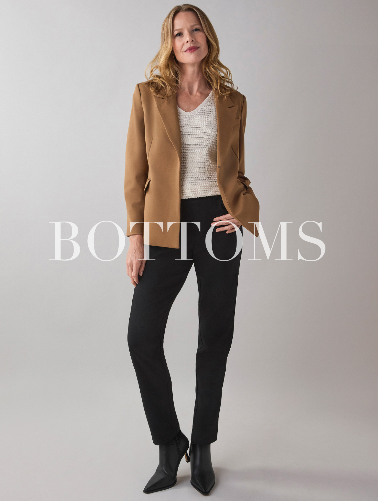Woman in a blazer and pants, text overlay reads 