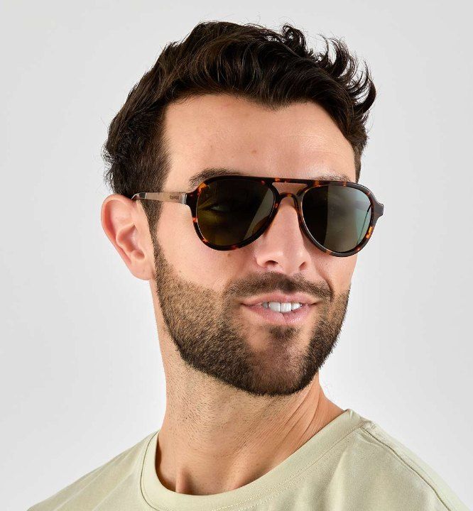 man wearing Runner sunglasses, classic tortoise aviators for triangle face shape