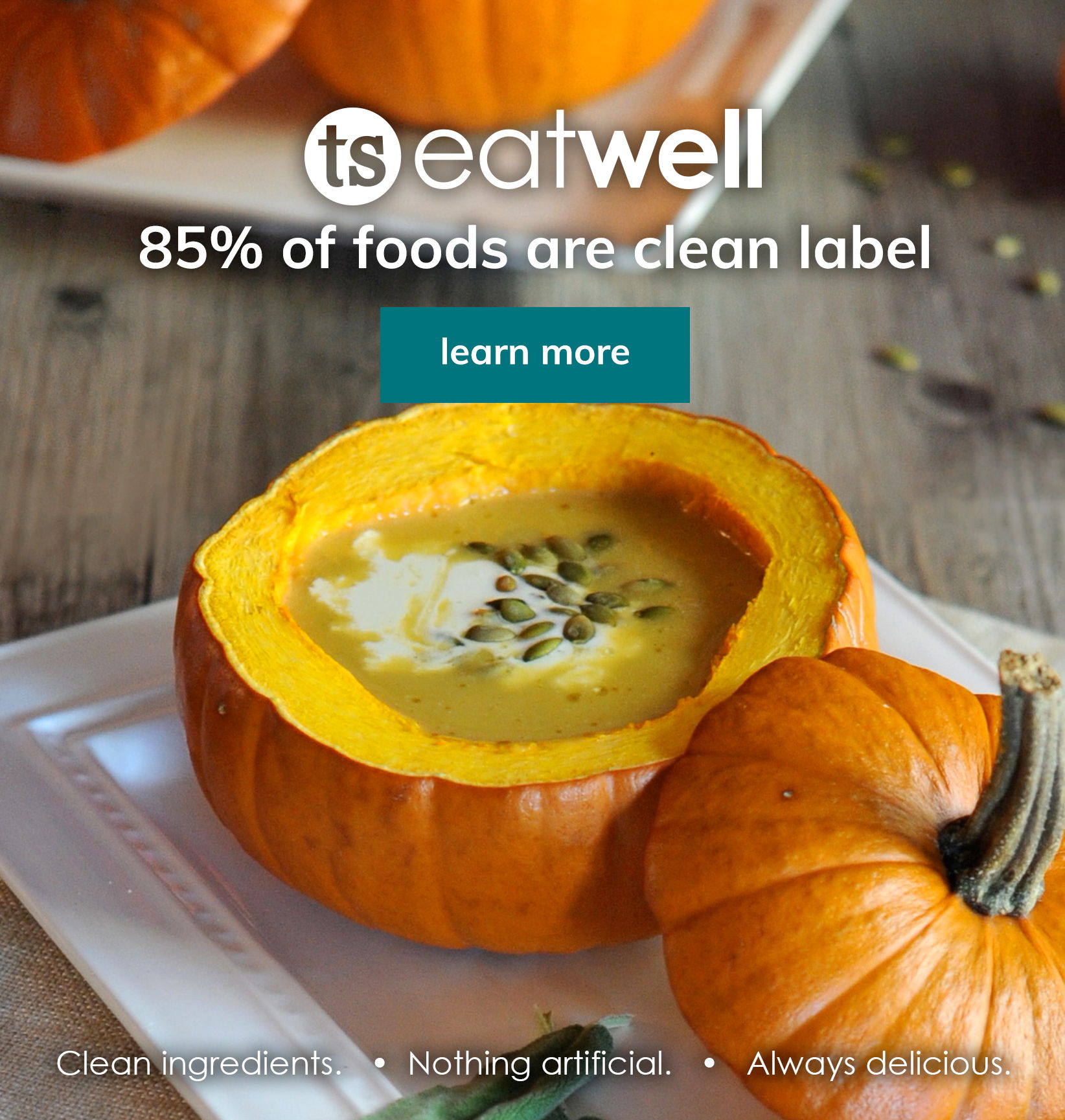 Pumpkin soup served in a hollowed pumpkin with the text “TS EatWell, 85% of foods are clean label” and a “Learn more” button.