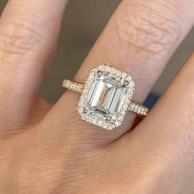 emerald cut diamond halo engagement ring