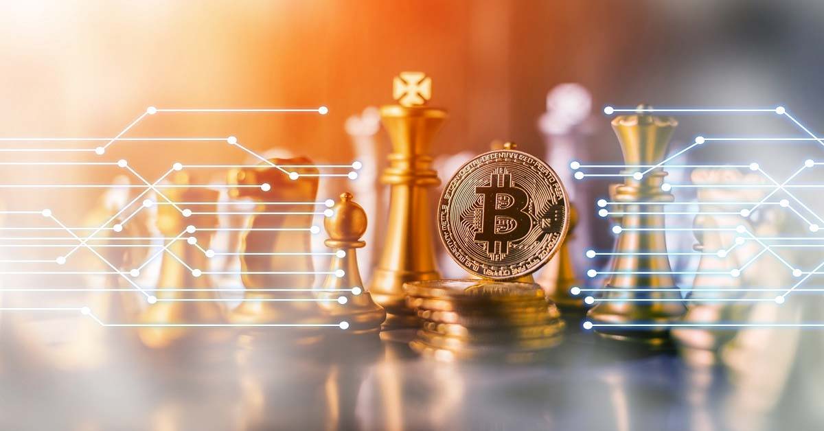Bitcoin on top of chess board