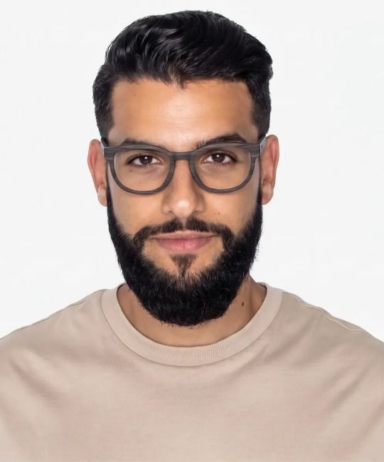man wearing Bliss Purple, rounded square eyeglasses on a white background