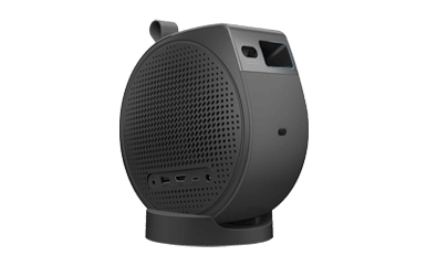 Black portable speaker with various ports and a rounded design.