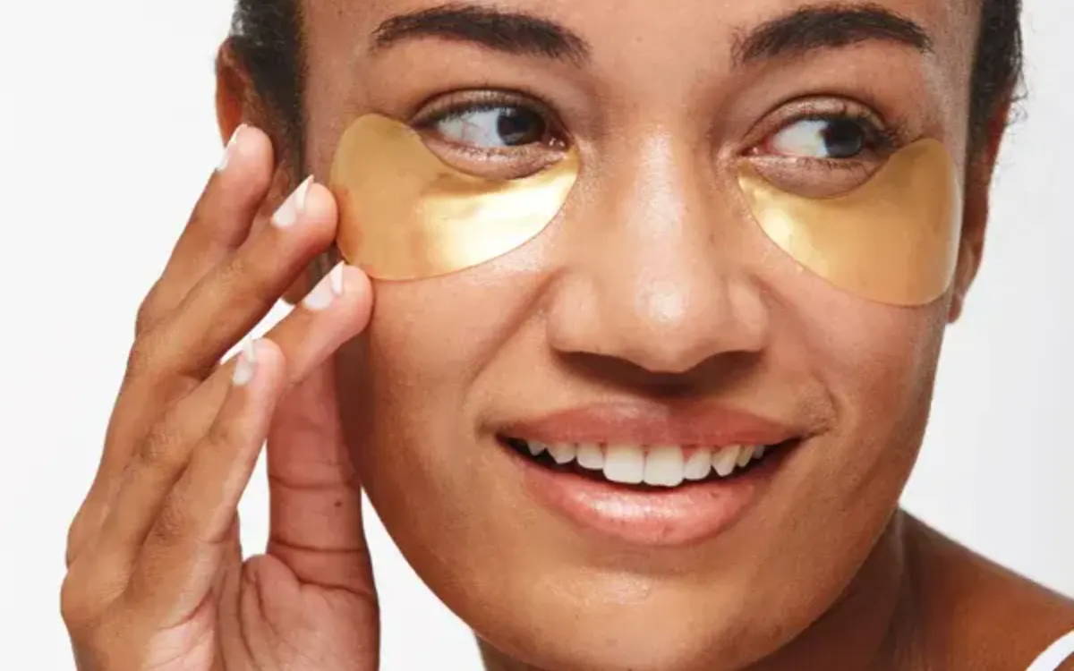 woman wearing depology gold aesthetic under-eye patches