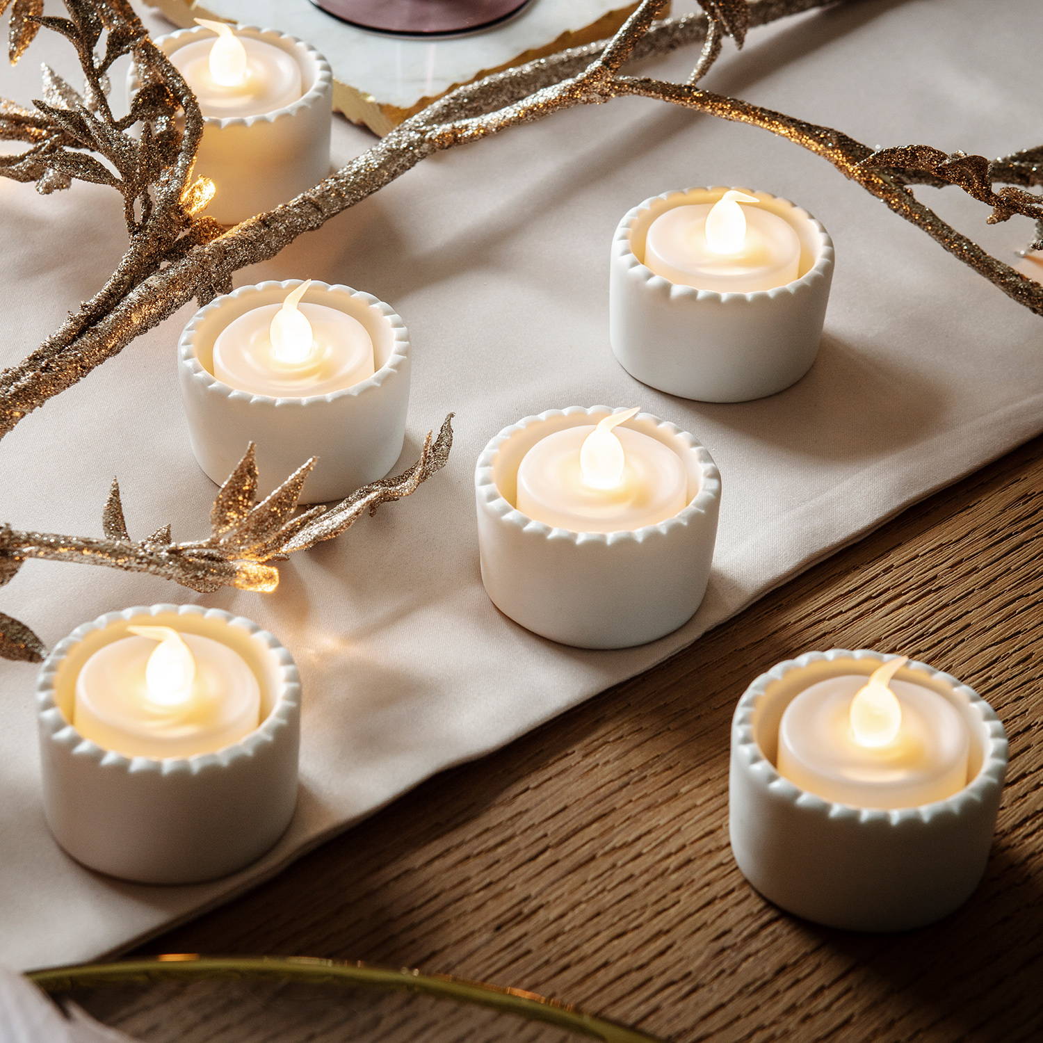 Tealights arranged as part of table display