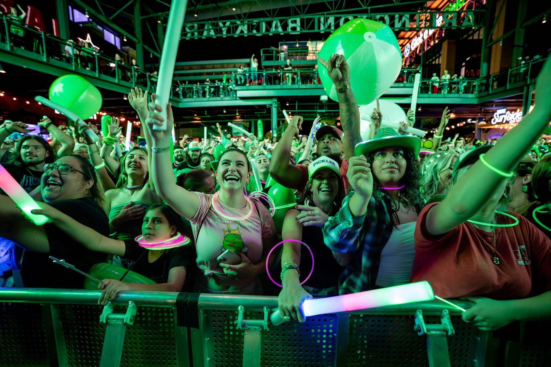 A sold-out crowd cheers at the Pickle RAVE headlined by national touring DJ PICKLE at The Big Dill pickle festival, Arlington Backyard at Globe Life Field and Texas Live!, Arlington Texas 2025.