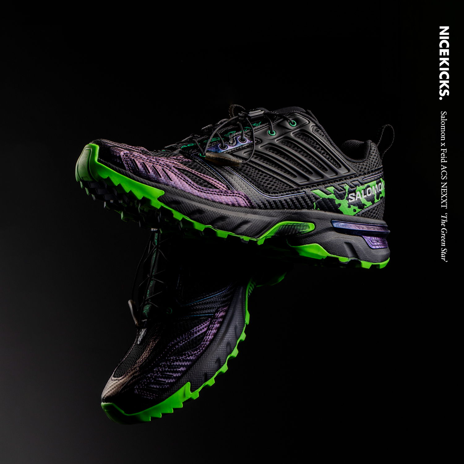 Black and green athletic shoes displayed against a dark background.