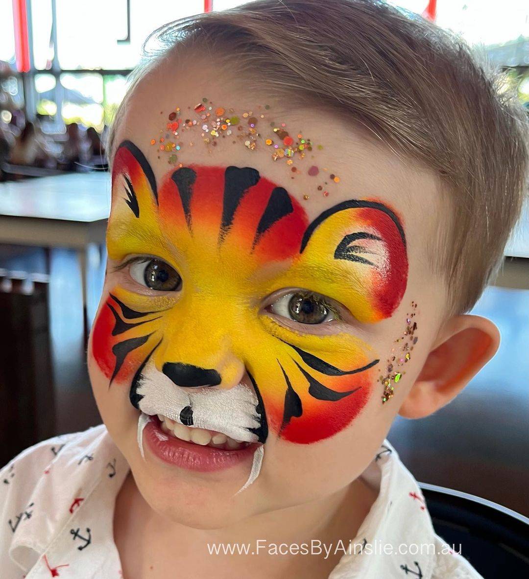 face paint cute tiger boy