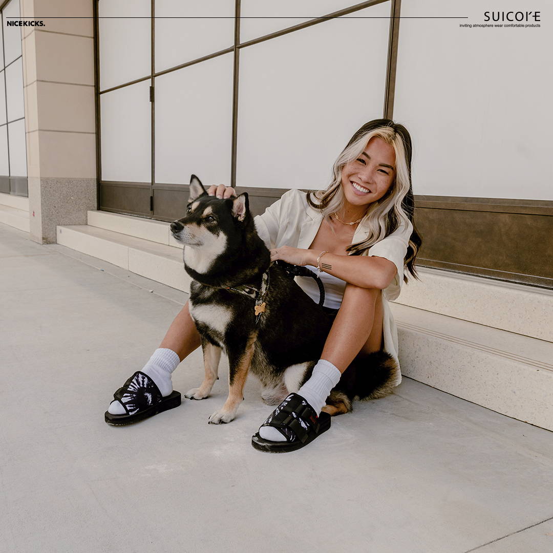 girl with dog wearing suicoke sandals
