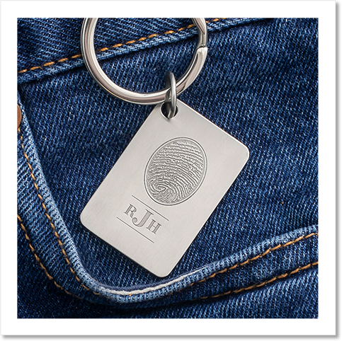stainless steel keychain engraved with a fingerprint and monogram