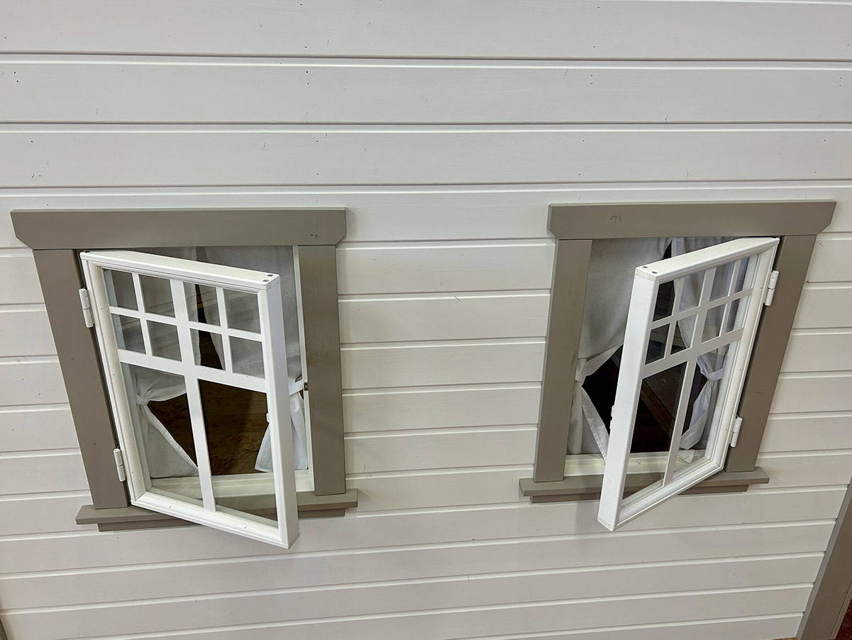 Close up of open safety glass Windows of Kids Outdoor Playhouse Grand Farmhouse by WholeWoodPlayhouses