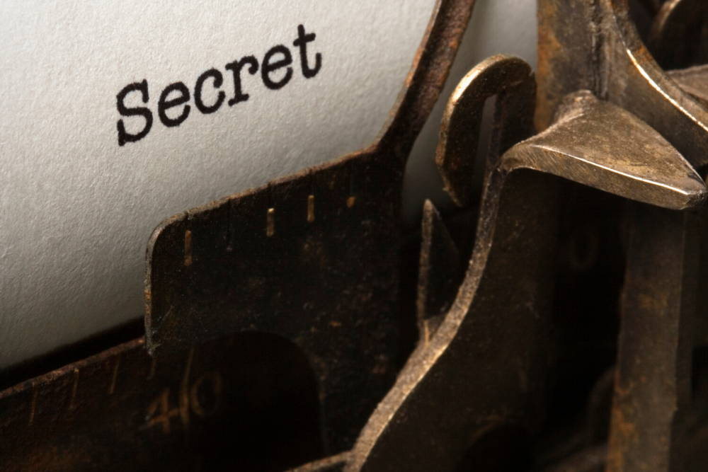 The word Secret on a typewriter|The Strangest Secret That’s Been Around For Thousands Of Years