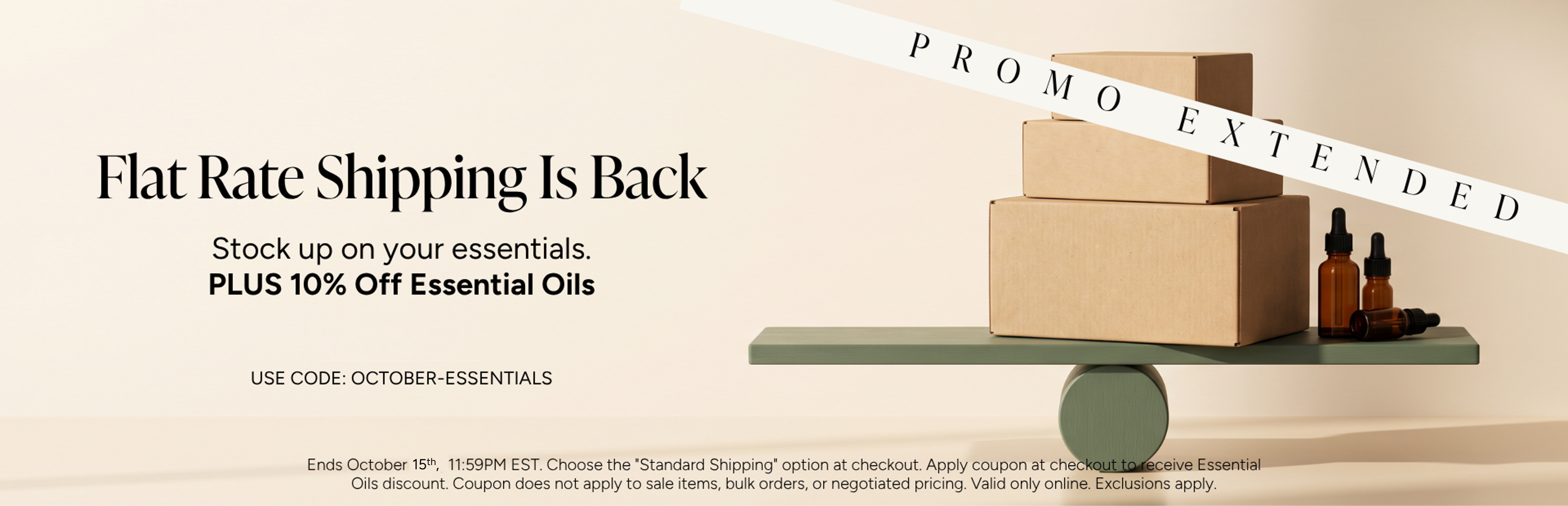Flat rate shipping announcement with boxes and essential oils on a display.