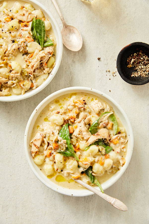 Two bowls of chicken gnocchi soup