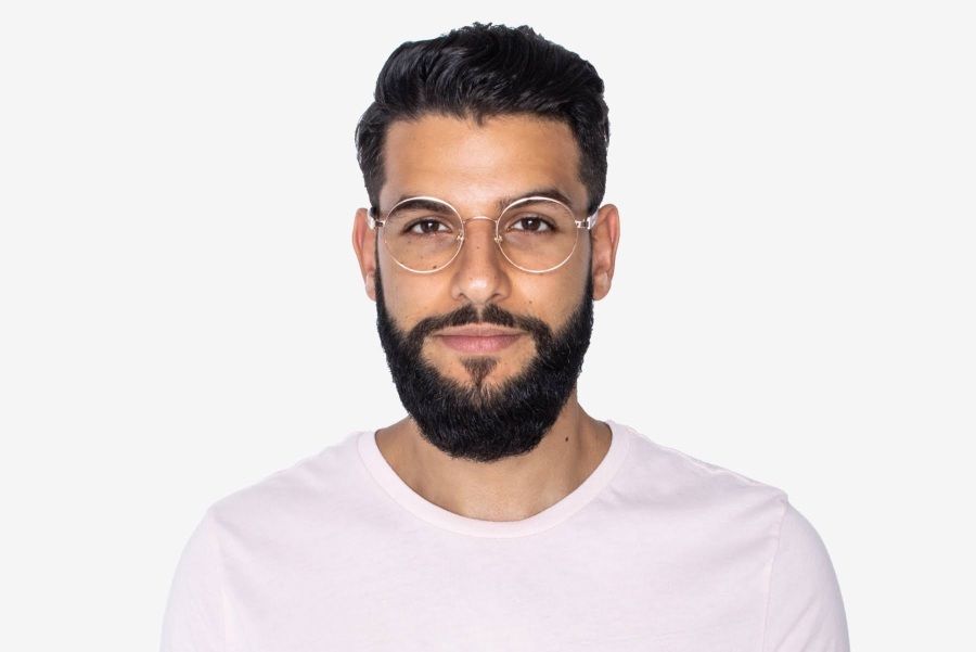 man with square face shape wearing round glasses