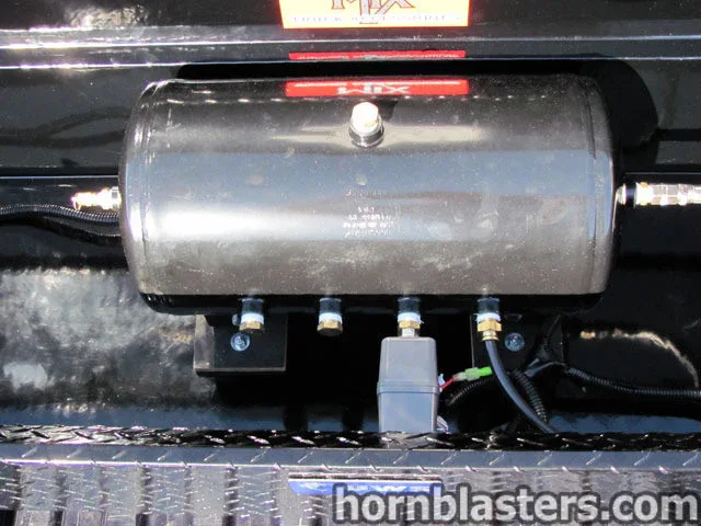Close-up Shocker XL horn bells mounting hardware on Silverado 1500 photo 6
