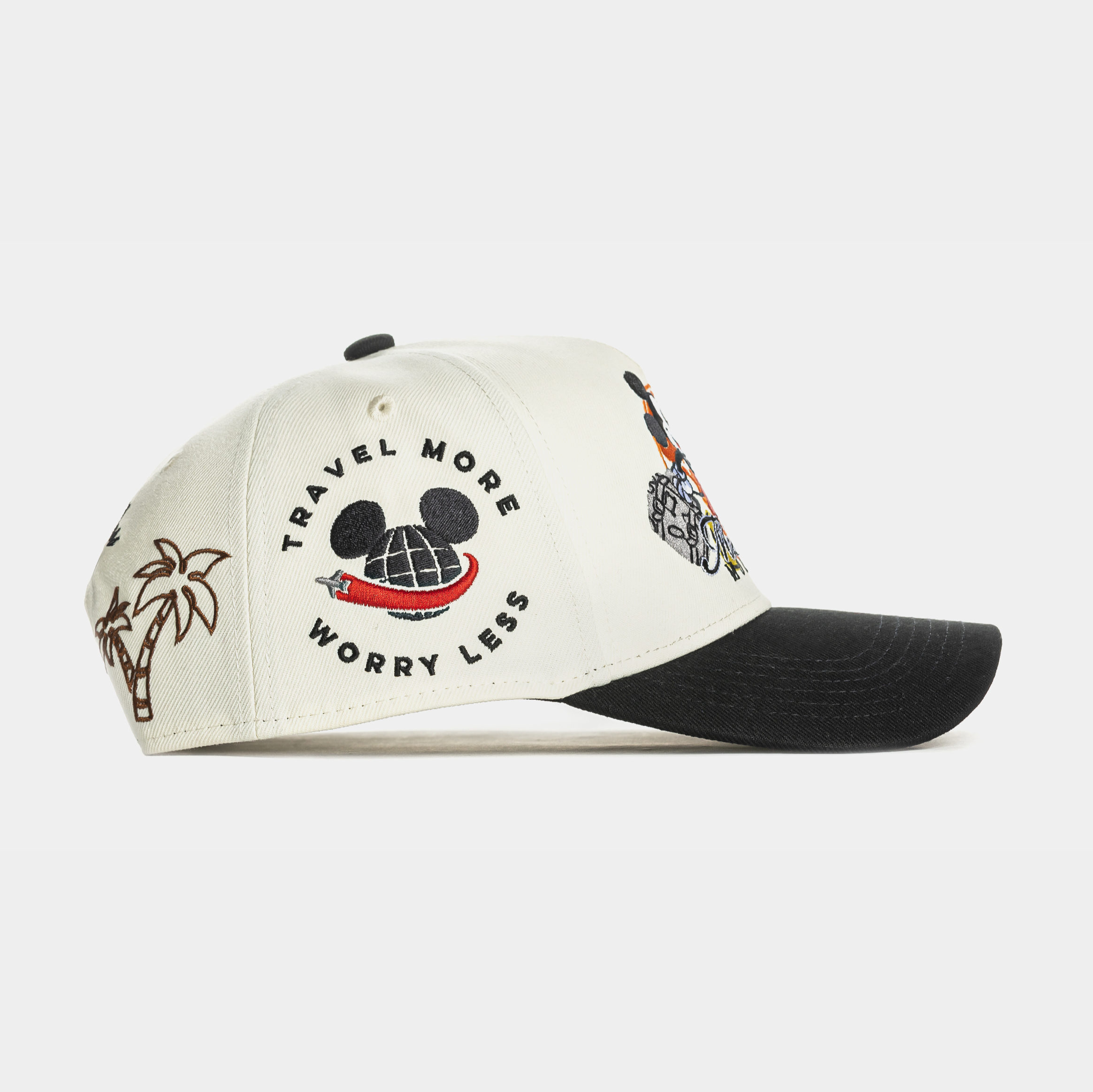 White cap featuring Mickey Mouse and 