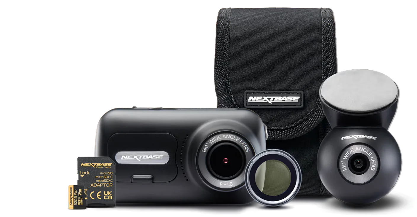 Camera accessories including a camera, lens, and carrying case.