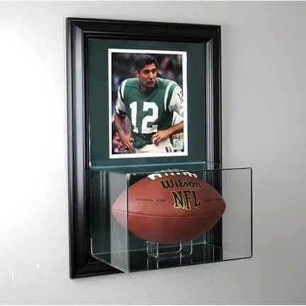 A football display case with a photo.