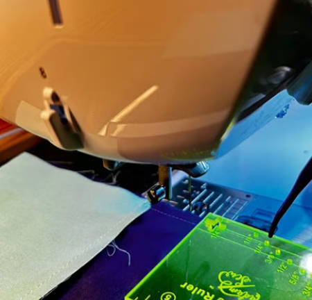 Checking The ¼-inch Measurement With The Seam Guide Ruler