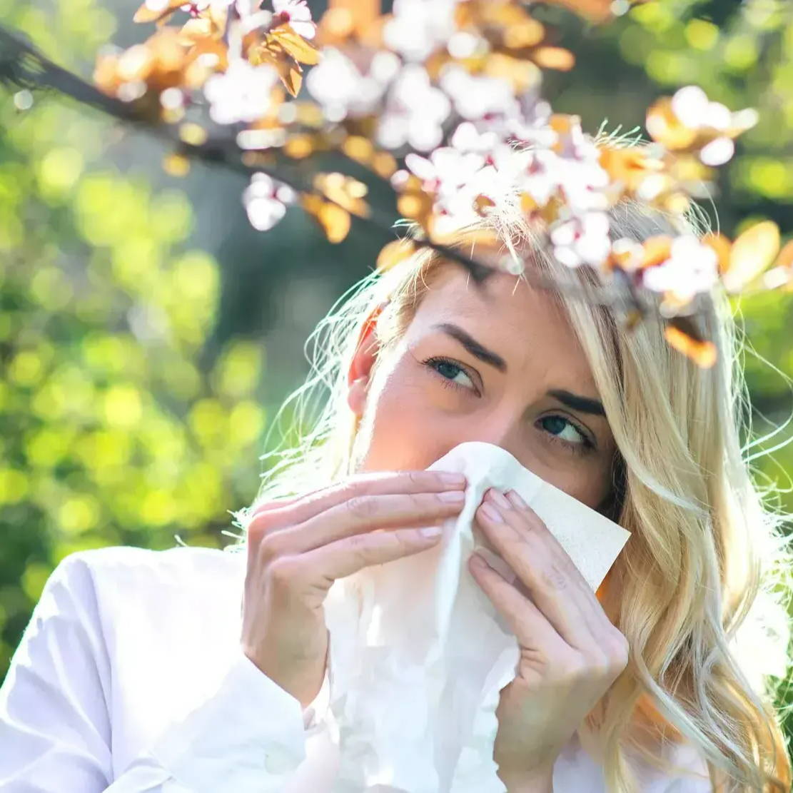 Young woman with seasonal hay fever