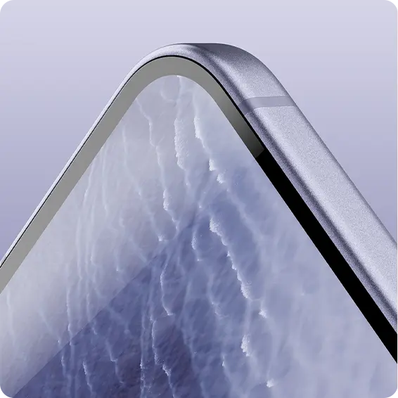 Close-up of a sleek smartphone with a curved edge and textured screen.